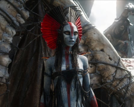 A tall cat-like person wearing a headress
