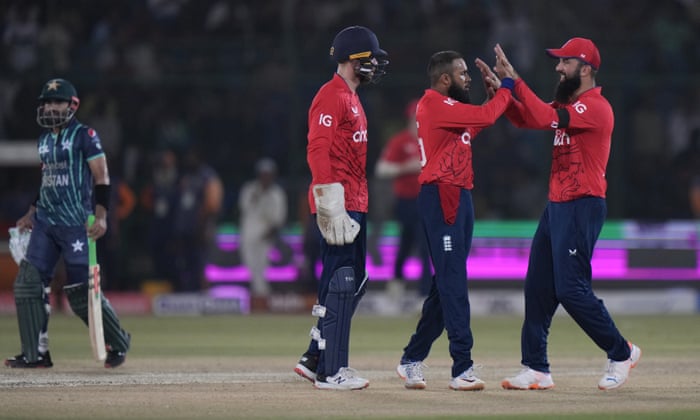 Pakistan v England: first men’s T20 cricket international – live | Pakistan v England 2022 7 Rashid celebrates the dismissal of Pakistan captain Babar
