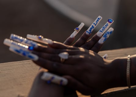 Sassie’s fingenails painted with ‘Long Live Takar’.