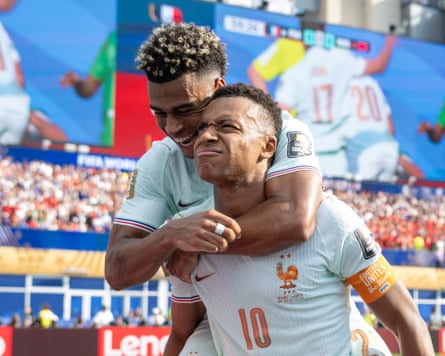Kylian Mbappé celebrates scoring against Morocco.