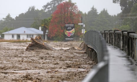 Redcliffe Bridge is closed off as debris piles up along the Tutaekuri River in the suburb of Taradale in Napier, New Zealand. (Photo by Kerry Marshall/Getty Images)