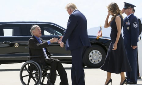 Donald and Melania Trump greet Greg Abbott after arriving in El Paso, Texas, in August.