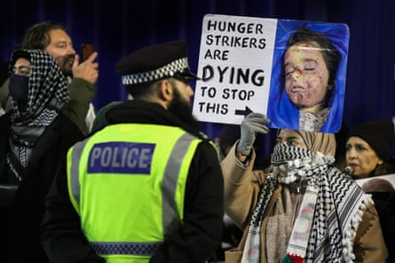 Activists demonstrate in support of Palestine Action hunger strikers outside Pentonville Prison in London.