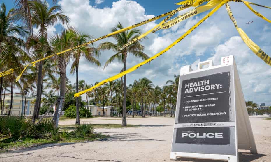 A health advisory in Miami Beach in March. Certain beaches in Florida have already reopened to the public.