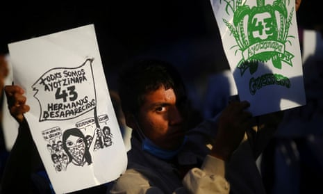 A student looks on in November as family members mark the 74th month since the disappearance of 43 student teachers from the Ayotzinapa Rural Teachers’ College.