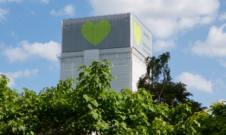 Grenfell Tower a year on, with cladding and a green heart