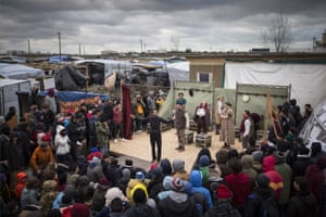 Actors from Shakespeare’s Globe perform Hamlet to migrants at the Good Chance theatre tent in the Jungle refugee camp in Calais, France