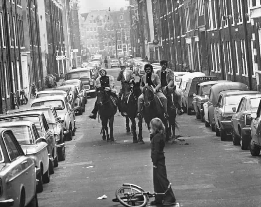 Four horsemen riding through the streets of Amsterdam, 4 November 1973.