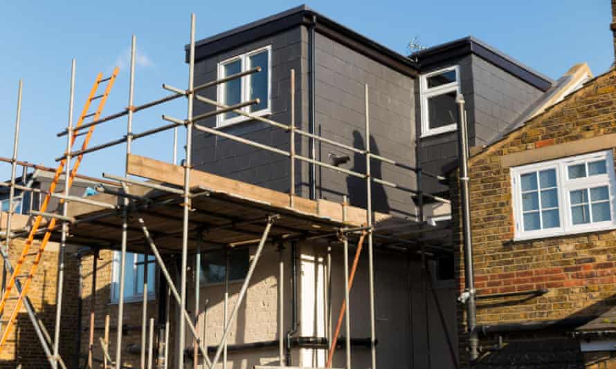 Scaffolding to a newly completed dormer on a Victorian terraced house