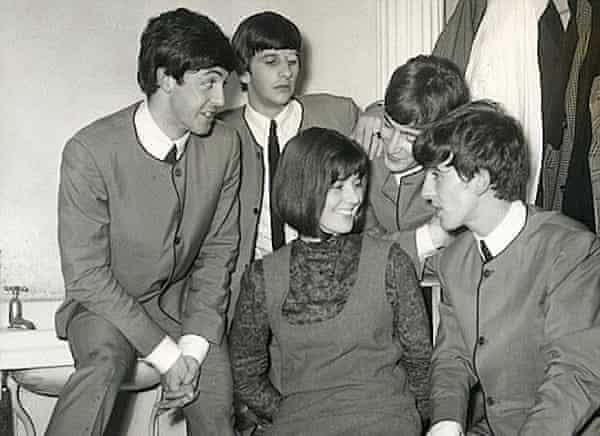 Maureen Cleave in a bathroom with the Beatles