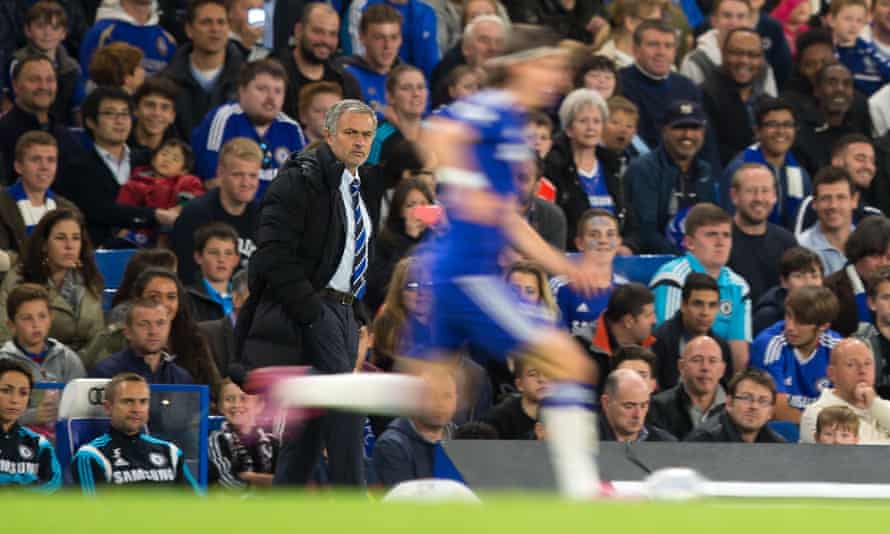 Filipe Luis runs past José Mourinho in 2014. ‘I didn’t want to work for Mourinho another year. But I tell you: it wasn’t just Mourinho’s fault.’