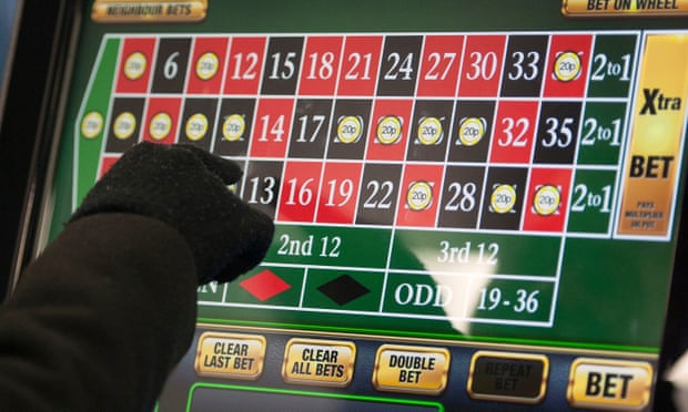 A person using a betting machine
