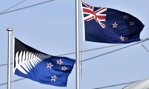 The current New Zealand flag (R) flutters next to the alternative flag (L) in Wellington on March 4, 2016.