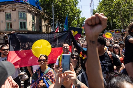 People participate in the Invasion Day rally in Melbourne