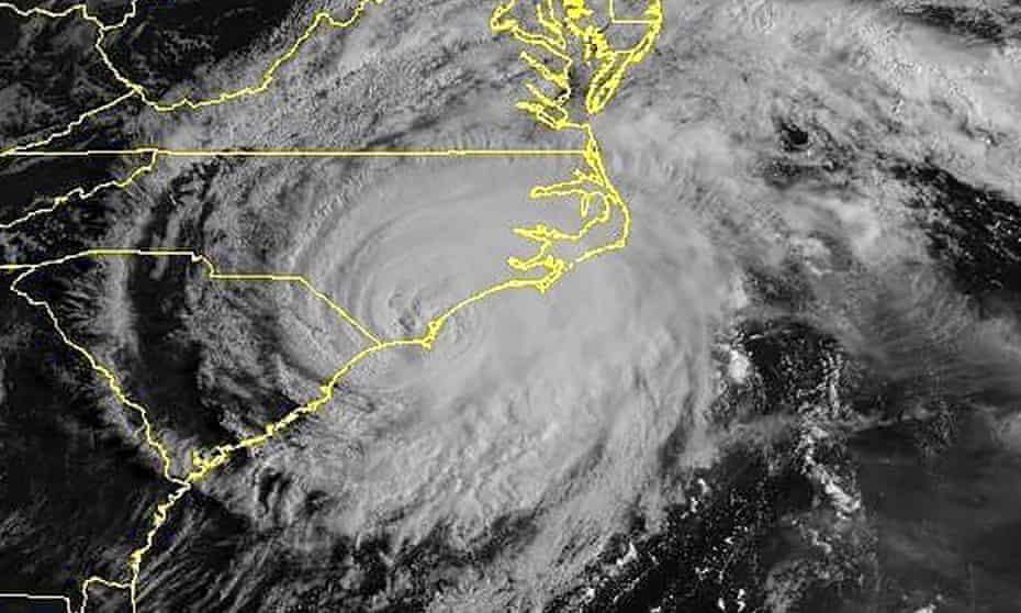 This satellite image, taken on 12.42am on 14 September, shows Hurricane Florence hitting the US east coast.