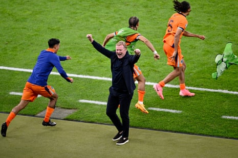 Netherlands coach Ronald Koeman celebrates after the quarter-final victory over Turkey.