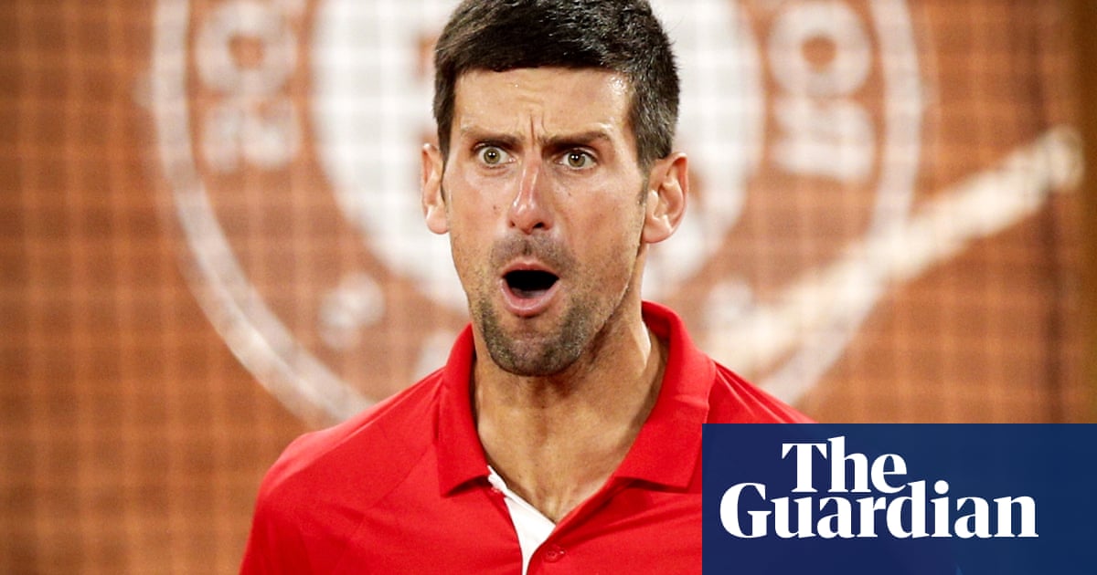 Djokovic shuts out French Open silence and boos to set up Nadal semi-final