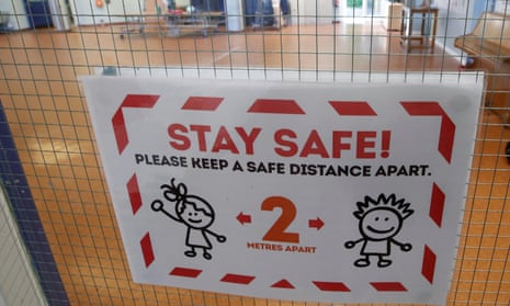 A 'stay safe' sign on a school door