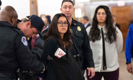 Protesters are arrested outside the confirmation hearing of Andrew Wheeler, nominee to be Environmental Protection Agency administrator.