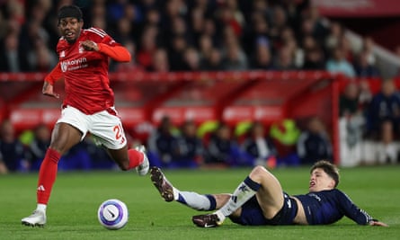 Nottingham Forest FC v Manchester United FC - Premier League<br>NOTTINGHAM, ENGLAND - APRIL 01: Anthony Elanga of Nottingham Forest evades the challenge from Alejandro Garnacho of Manchester United on the way to scoring his side's opening goal during the Premier League match between Nottingham Forest FC and Manchester United FC at City Ground on April 01, 2025 in Nottingham, England. (Photo by Michael Steele/Getty Images)