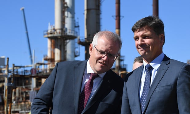 Australian prime minister Scott Morrison (left) and energy minister Angus Taylor (right) are seen during a tour of the Ampol Lytton Refinery in Brisbane, 17 May 2021. 