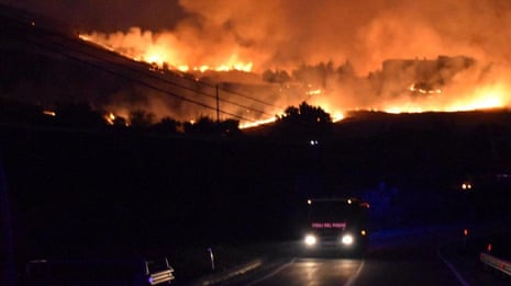 Firefighters battle flames for 12 hours in worst night of southern Italy wildfires – video
