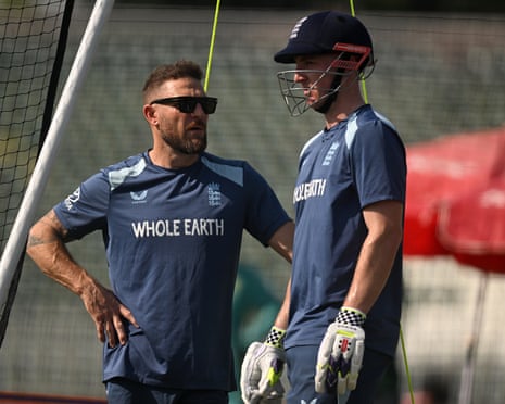 Head coach Brendon McCullum chats to Harry Brook at the Rawalpindi cricket stadium before England play in the tri-nations series