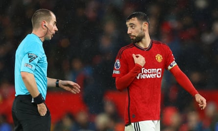 Bruno Fernandes is booked for dissent.