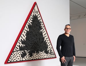 Gil Vazquez, president of the Keith Haring Foundation, in front of Pile of crowns for Jean-Michel Basquiat at the NGV.