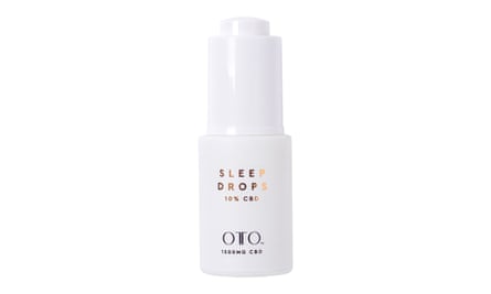 A small white bottle of OTO CBD sleep drops with gold and black lettering