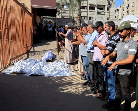 Mourners pray as they attend the funeral of Palestinians killed, in what the Gaza Health Ministry said, were overnight Israeli airstrikes on tents sheltering displaced people, at Nasser hospital, in Khan Younis, southern Gaza Strip, June 26, 2025.