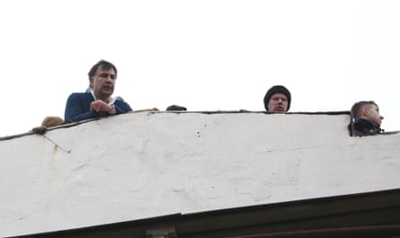 Mikheil Saakashvili appears on a rooftop