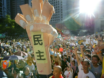 Protesters chant slogans calling for political reforms in 2003
