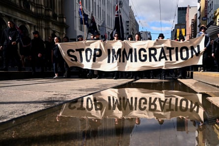Protesters march down Bourke Street in Melbourne’s CBD