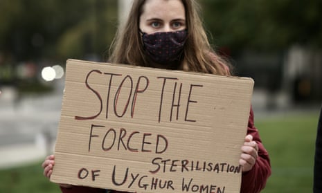 A woman at a London protest in support of the Uighur people over ongoing human rights violations in China’s Xinjiang autonomous region, on 8 October 2020.
