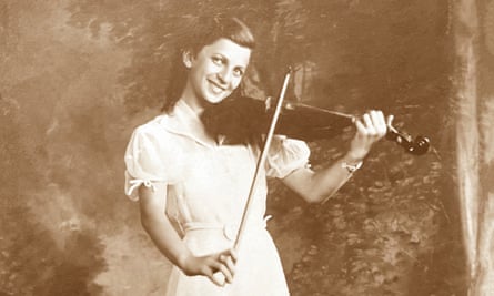 Mildred Kirschenbaum playing the violin in a sepia photo