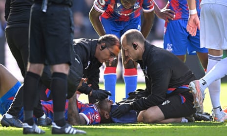 Jordan Ayew receives medical attention