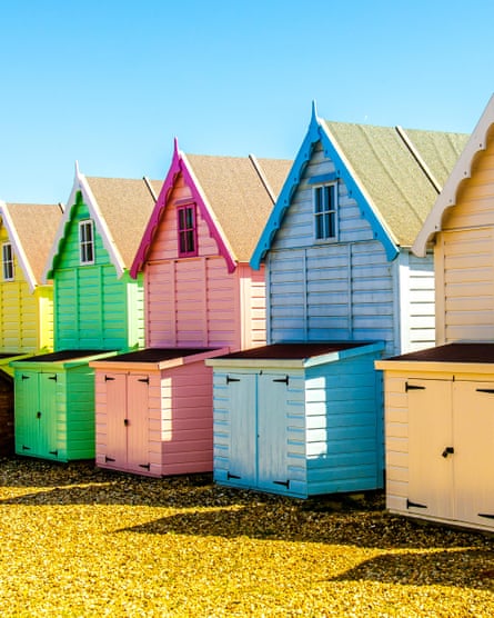 ‘Beach bunnies flock to this unspoilt nub of land’: beach huts at West Mersea, Essex.