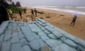 a wall of sandbags on the beach at Songkhla, Thailand