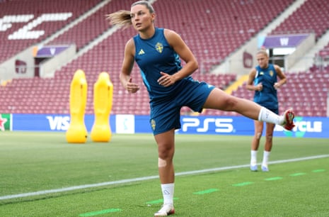 Sweden’s star player and all-time record goalscorer Johanna Rytting Kaneryd gets her stretch on before training at the Stade de Geneve yesterday.