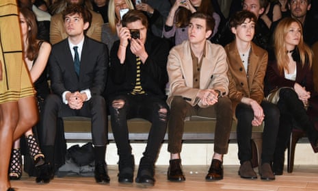 Brooklyn Beckham, with camera, at a Burberry show in London