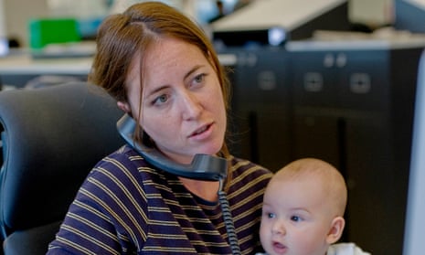 Woman with baby in office