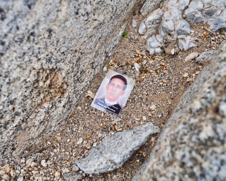 small portait picture left on the ground