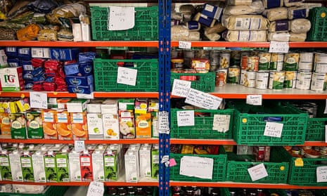 Donated food on n shelves inside a food bank in Bristol. Food banks are running out of donations as demand increases.