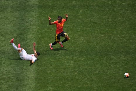 Iran's Mehdi Taremi reacts after a foul by Belgium's Nathan Ngoy.
