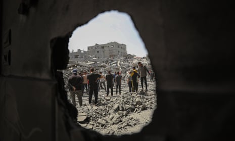 Buildings are destroyed and surrounding buildings and vehicles were heavily damaged at al-Daraj neighbourhood after Israeli attack, in Gaza City, Gaza on April 22, 2024.