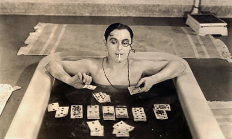 Lupino Lane Playing Soggy Solitaire in <br>1926 --- As one of the idle rich, Lupino Lane’s character plays solitaire in the bathtub. --- Image by Bettmann/CORBIS Fool’s Luck Motion Picture, 1926