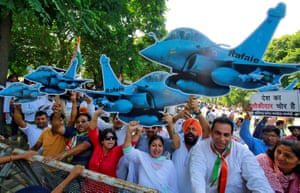 Opposition supporters in Chandigarh, India, protest against a 2015 deal to buy 36 French Rafale fighter jets