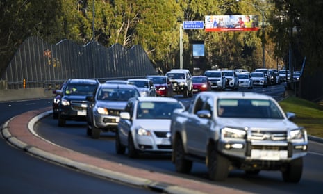 A traffic jam is seen ahead of a border check point in July in the NSW-Victoria border town of Albury.