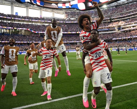 Folarin Balogun celebrates with teammates after scoring his team's third goal during their win over Paraguay